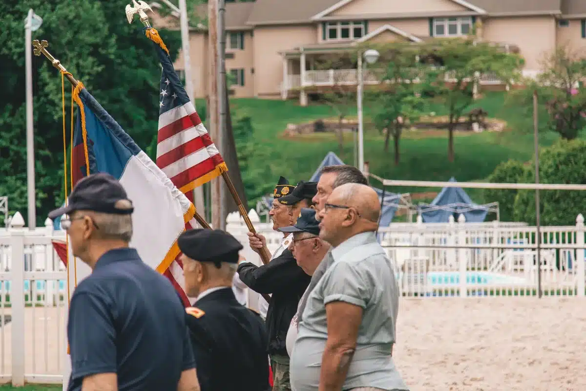 Veterans and community members gathered in conversation at a local event.