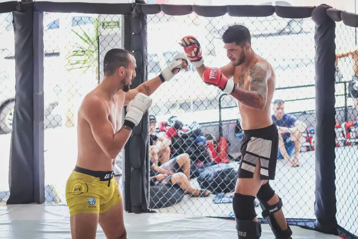 Fighter executing precise striking combination with controlled hand placement