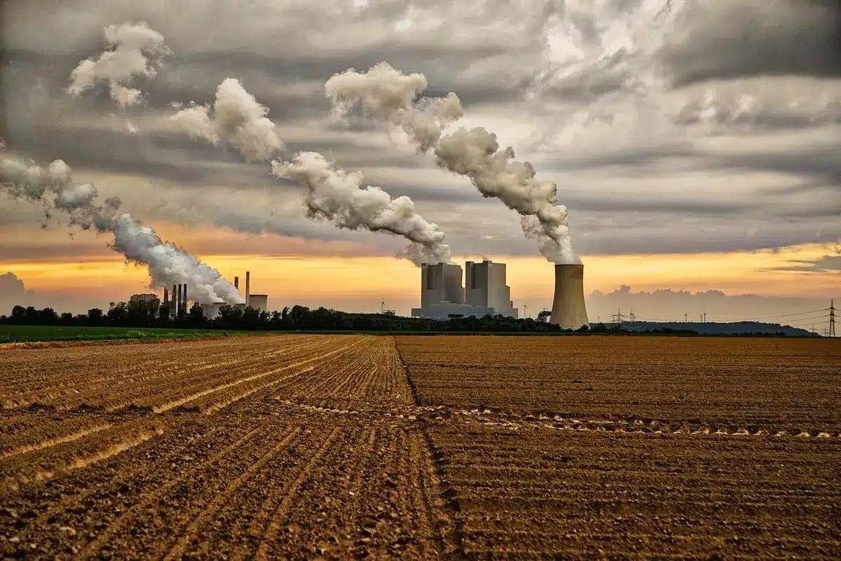 Large industrial cooling towers and water infrastructure at a facility