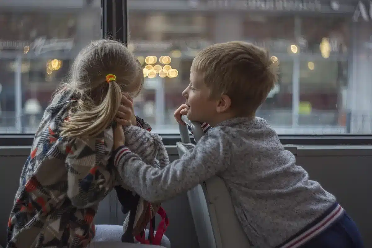 Parent and child having conversation about online safety and screen time