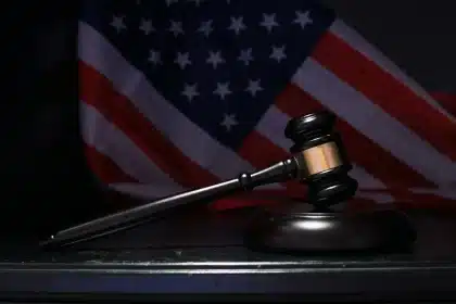 Gavel and smartphone symbolizing legal accountability for social media platforms