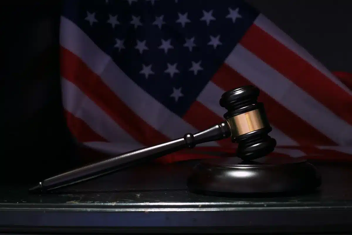Gavel and smartphone symbolizing legal accountability for social media platforms