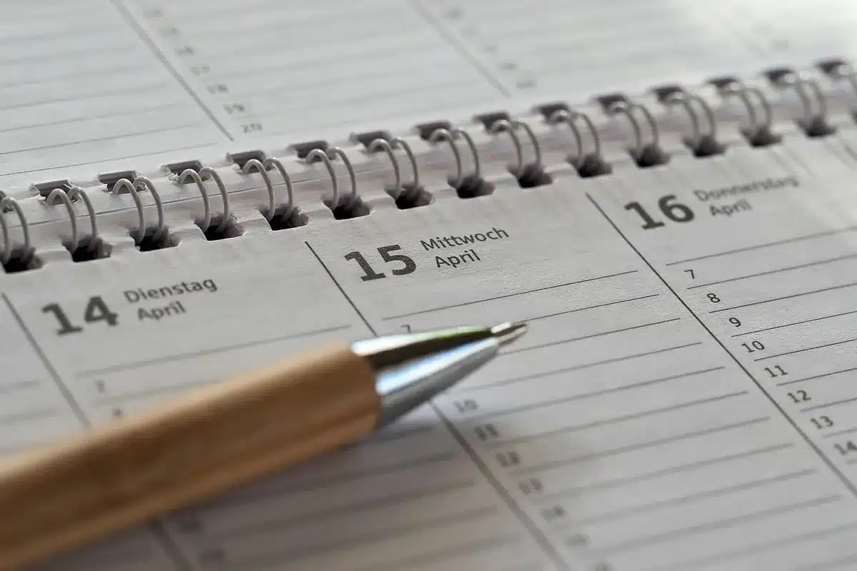 Calendar showing key migration dates and system downtime window