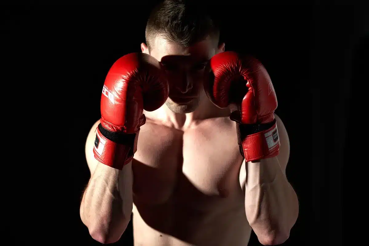 UFC fighters engaged in striking exchanges inside the octagon