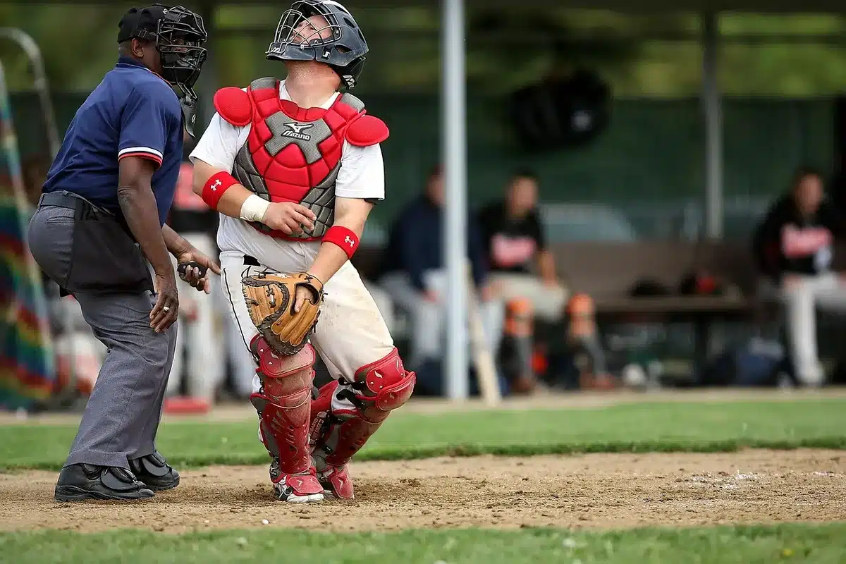 Pitcher staring from dugout before a short playoff game