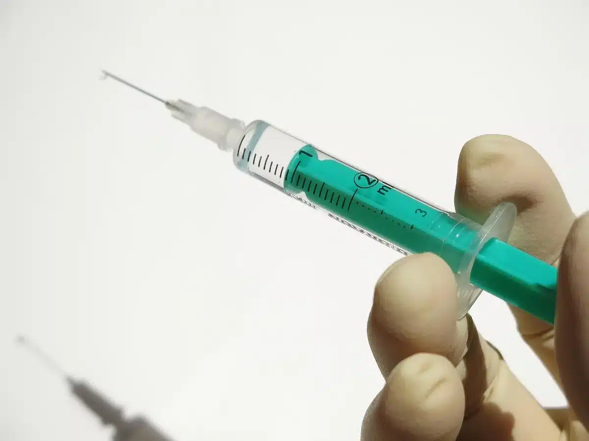 People queuing for seasonal flu vaccination at a clinic