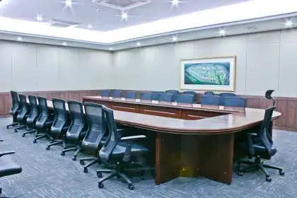 Empty county meeting room with folders and a map on the table