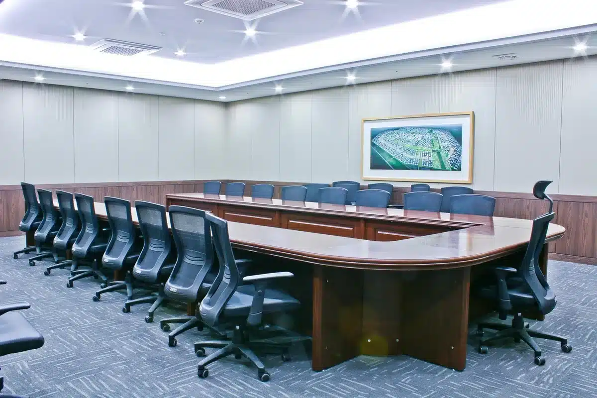 Empty county meeting room with folders and a map on the table