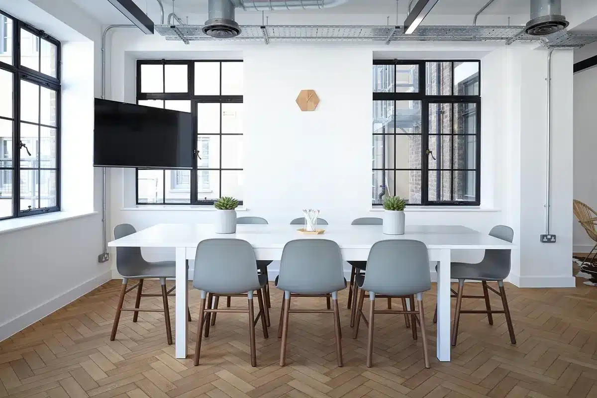 Person taking a short walk in an office corridor to break up sitting