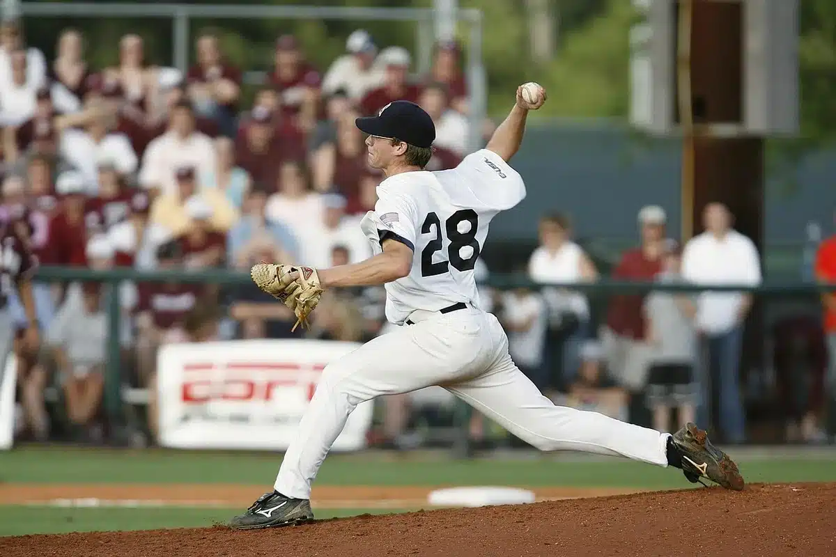 Batter stepping out of the box with hands on hips, reflecting a hitting slump